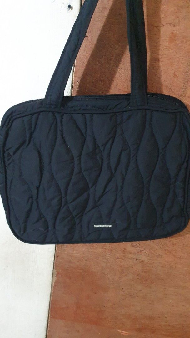 Black Quilted Tote Bag laptop (Category: Tote Bags) located in Marilao. Submitted by majoriety (Listing ID 1460863607, Image 1). Description: 18x13x3in - Stylish black quilted tote bag - Two comfortable carrying handles - Secure zipper closure for top access - Lined interior with a small tag - Ample space for everyday essentials or travel needs - Versatile for daily use or getaways.