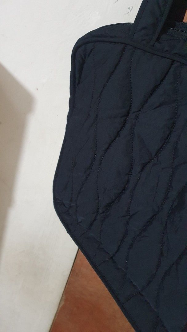 Black Quilted Tote Bag laptop (Category: Tote Bags) located in Marilao. Submitted by majoriety (Listing ID 1460863607, Image 2). Description: 18x13x3in - Stylish black quilted tote bag - Two comfortable carrying handles - Secure zipper closure for top access - Lined interior with a small tag - Ample space for everyday essentials or travel needs - Versatile for daily use or getaways.