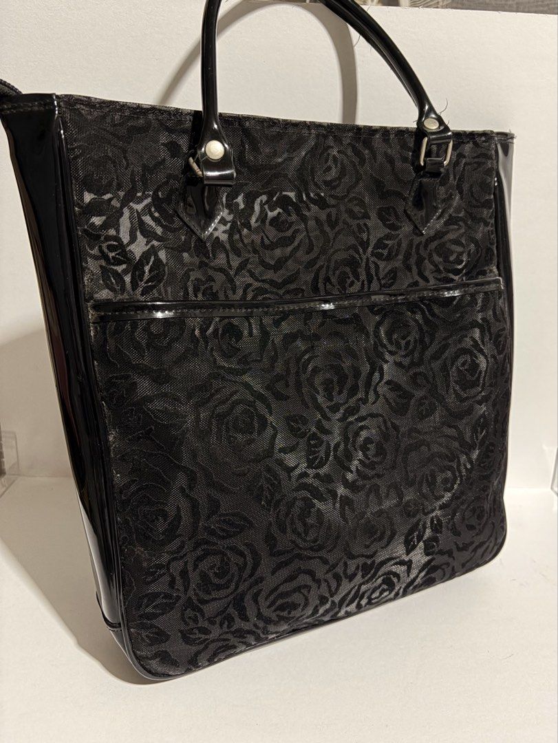 Black Rose See-through Handbag (Category: Tote Bags) located in Quezon City. Submitted by wagwagan_ukay_blues (Listing ID 1460828389, Image 1). Description: from Japan in good condition L -11” W-2” H-12”.
