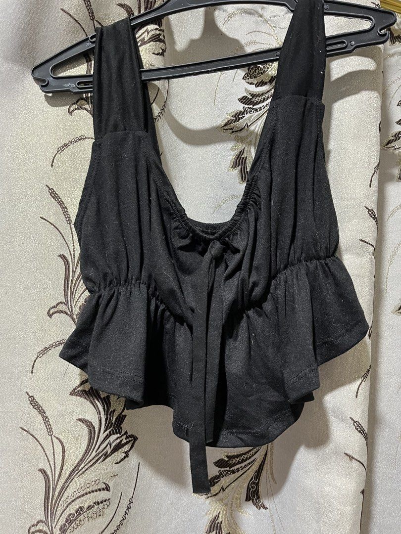 Black Ruffle Peplum Tie Front Crop Top (Category: Sleeveless) located in Manila. Submitted by jamalynnah (Listing ID 1460881107, Image 2). Description: - Ruffled peplum hem - Comfortable wide straps Small to Semi Large.