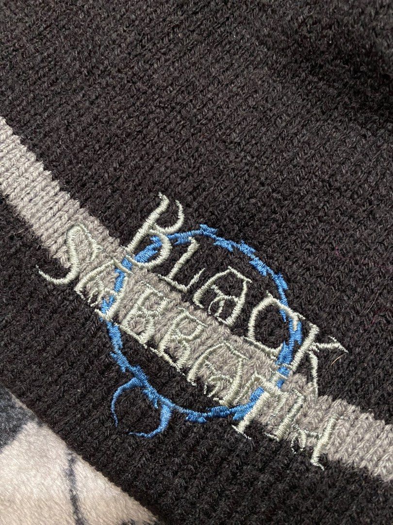 Black Sabbath, Beanie hat (Category: Beanies) located in Cavite. Submitted by jc_thrift95 (Listing ID 1460780549, Image 3). Description: - a black knit beanie with a grey horizontal stripe and embroidered “Black Sabbath” lettering. - Made in USA - Color rate 7/10 discoloration - See details picture for dimes..