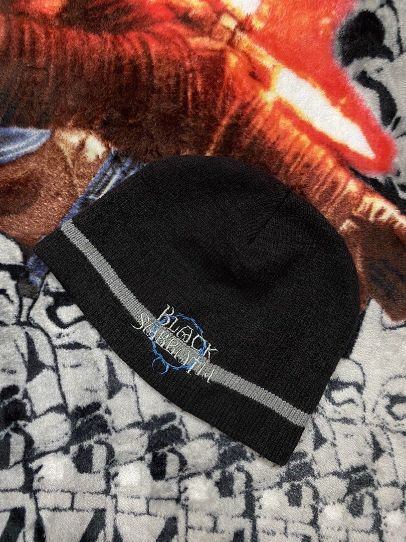 Black Sabbath, Beanie hat (Category: Beanies) located in Cavite. Submitted by jc_thrift95 (Listing ID 1460780549, Image 1). Description: - a black knit beanie with a grey horizontal stripe and embroidered “Black Sabbath” lettering. - Made in USA - Color rate 7/10 discoloration - See details picture for dimes..