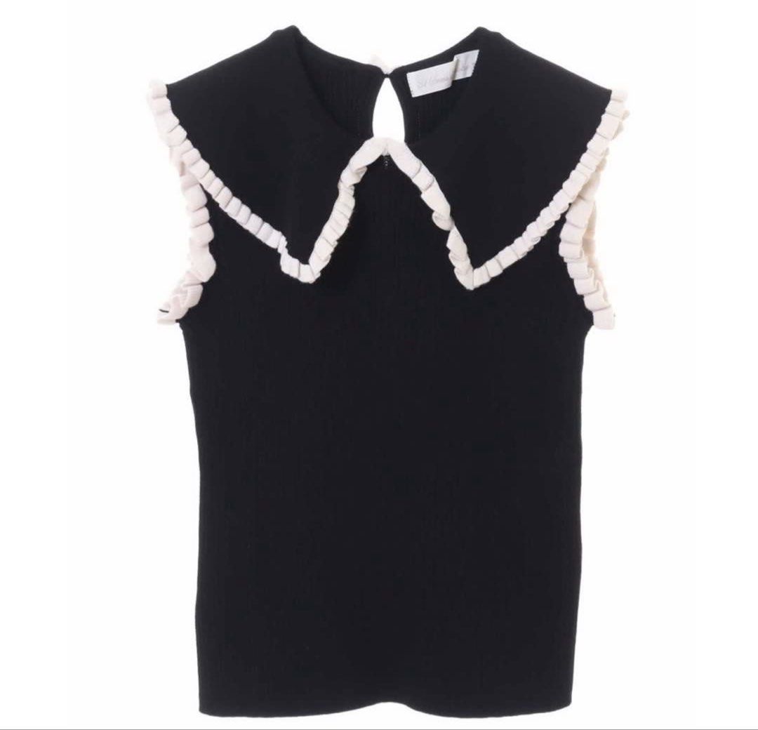 Black Sleeveless Top with Ruffled Peter Pan Collar (Category: Sleeveless) located in Manila. Submitted by jag888 (Listing ID 1460876873, Image 1). Description: - Black knit sleeveless top - Large Peter Pan collar with ruffled cream trim - Keyhole cutout at the back - Versatile styling with skirts or trousers - Chic and stylish piece.