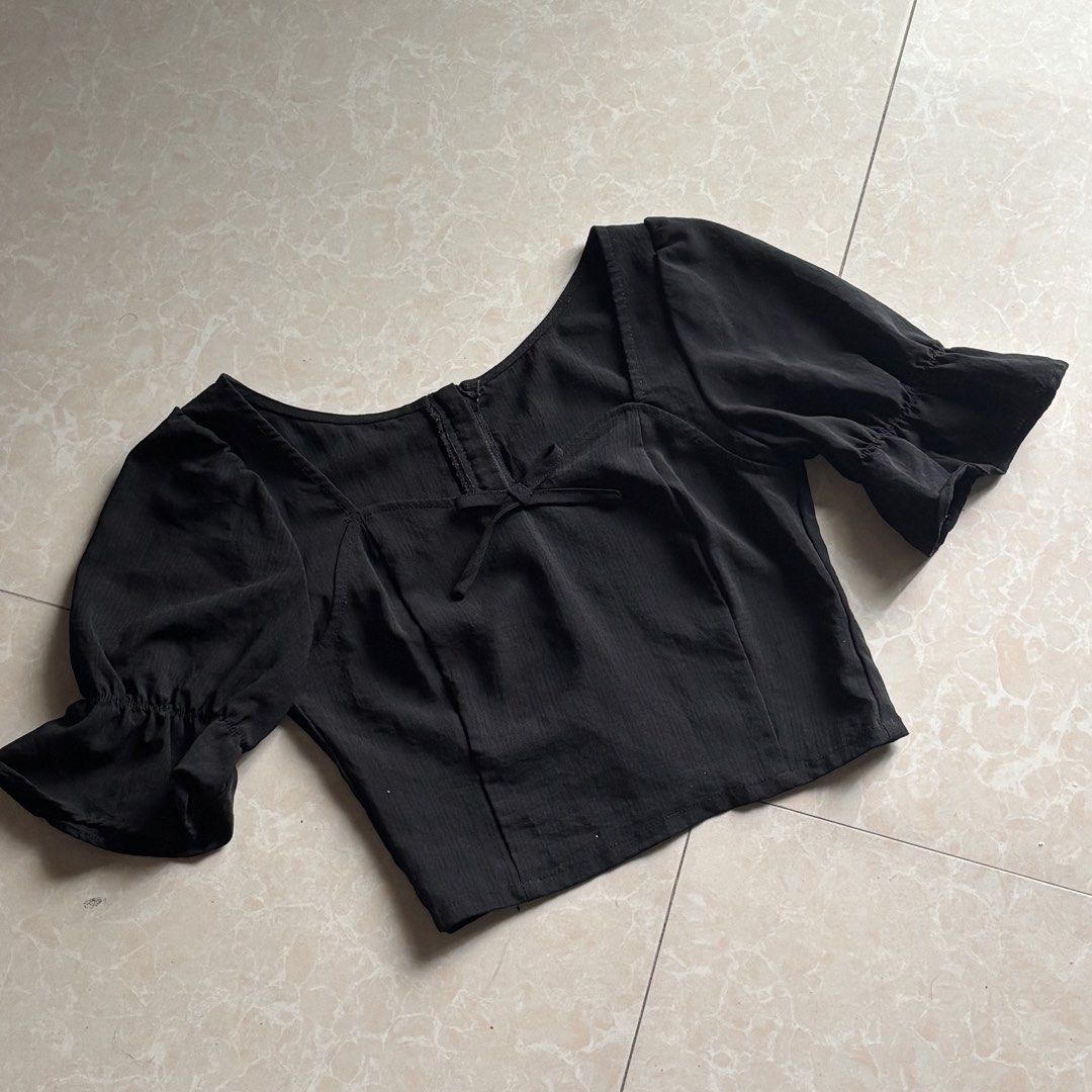 Black Square Neck Puff Sleeve Crop Top (Category: Blouses) located in Manila. Submitted by glenkm (Listing ID 1460787643, Image 1). Description: - Chic black crop top - Flattering square neckline with adjustable tie detail - Trendy puff sleeves with delicate ruffled cuffs - Convenient back zipper closure.