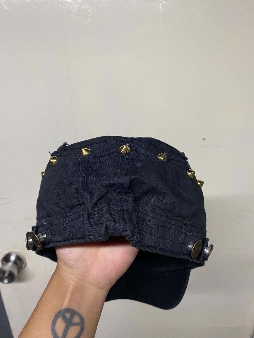 Black Studded Military Cap with Gold Studs (Category: Caps & Hats) located in Pasig City. Submitted by jstnisidor81288 (Listing ID 1460906461, Image 3). Description: - Cool black cap with gold studs all around. - Military style with a distressed look. - Adjustable strap at the back. - Adds an edgy vibe to any outfit. - Unique design..