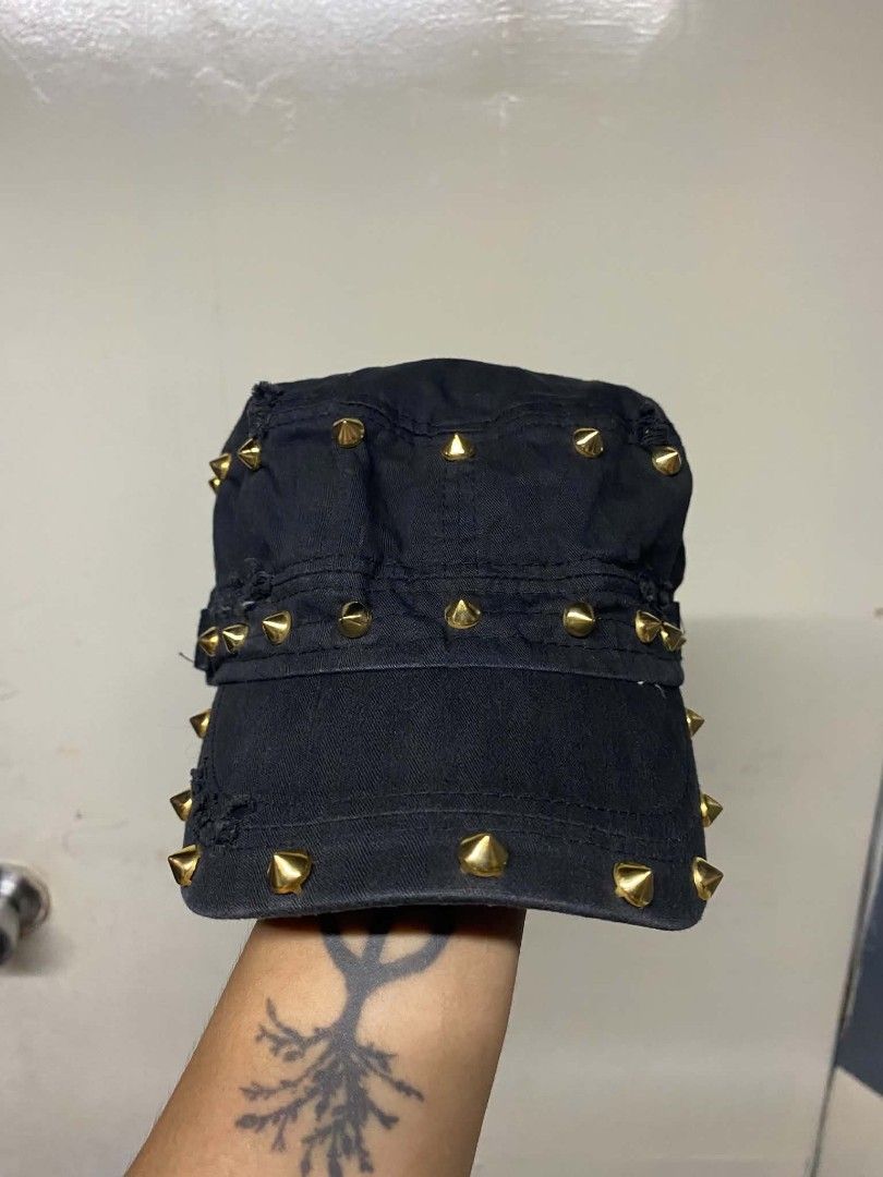 Black Studded Military Cap with Gold Studs (Category: Caps & Hats) located in Pasig City. Submitted by jstnisidor81288 (Listing ID 1460906461, Image 1). Description: - Cool black cap with gold studs all around. - Military style with a distressed look. - Adjustable strap at the back. - Adds an edgy vibe to any outfit. - Unique design..