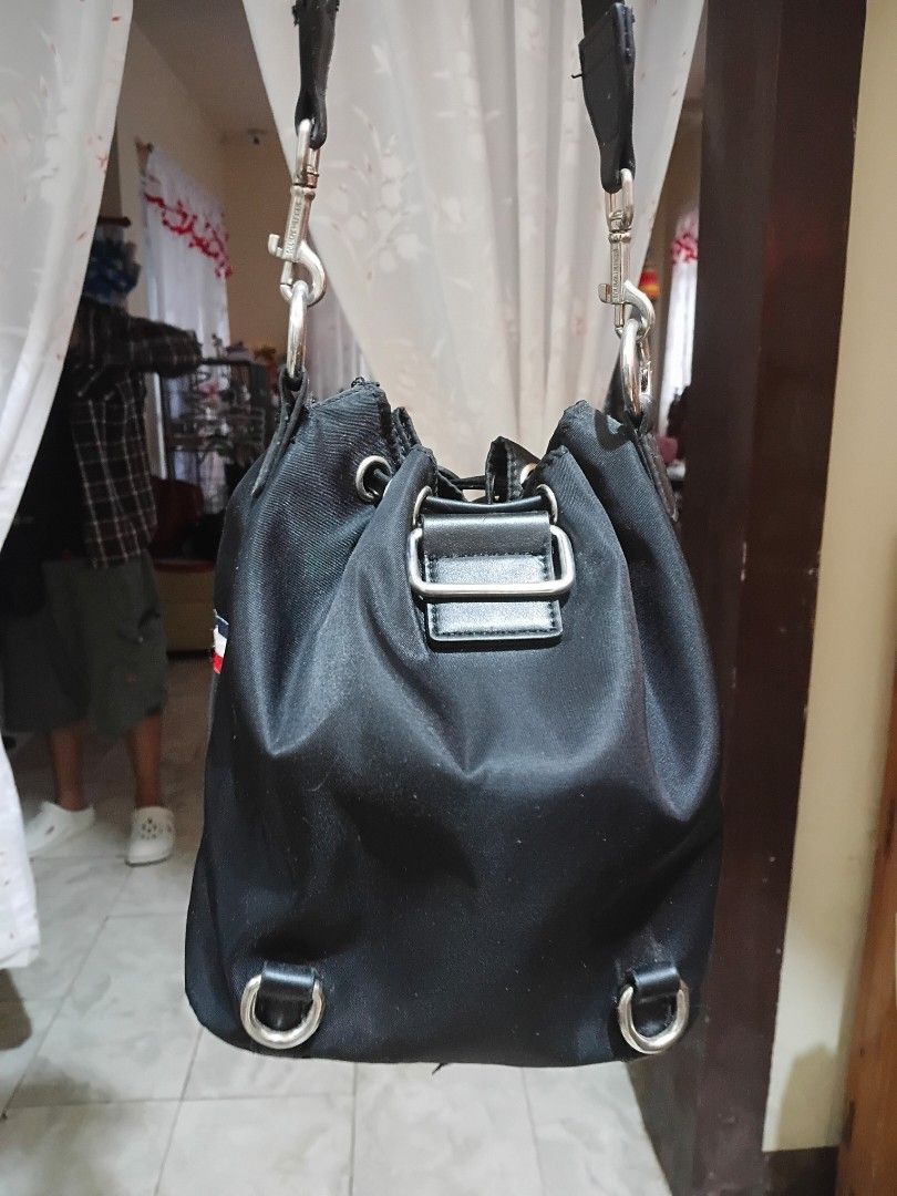 Tommy Hilfiger Bucket Bag (Category: Cross-body Bags) located in Cavite. Submitted by ms.de.clutter (Listing ID 1460791957, Image 2). Description: - Authentic Tommy Hilfiger black bucket bag - Secure drawstring closure - Includes a long strap for versatile carrying - Perfect for everyday use - 2 way bag : can be worn as backpack or sling bag.