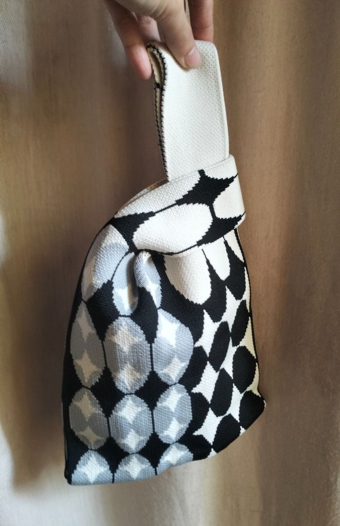 Black White Geometric Knit Knot Bag (Category: Shoulder Bags) located in Caloocan City. Submitted by pretaporter.2026 (Listing ID 1460768320, Image 2). Description: Perfect on Coffee Date, Beach Aesthetics, Carry Bag Well Take Care, once nagamit Rfs: Declutter.