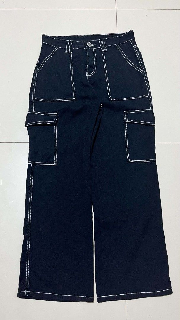 Black Wide Leg Cargo Pants with White Stitching (Category: Other Bottoms) located in Manila. Submitted by sandobag (Listing ID 1460864507, Image 1). Description: Cargo Pants ( Womens) Size: W 29-30 L 38.5 Excellent condition Color rate:10/10 - Black wide leg cargo pants - Contrast white stitching throughout - Multiple pockets on front and sides - Button and zip closure at waist - Relaxed fit, perfect for casual wear.