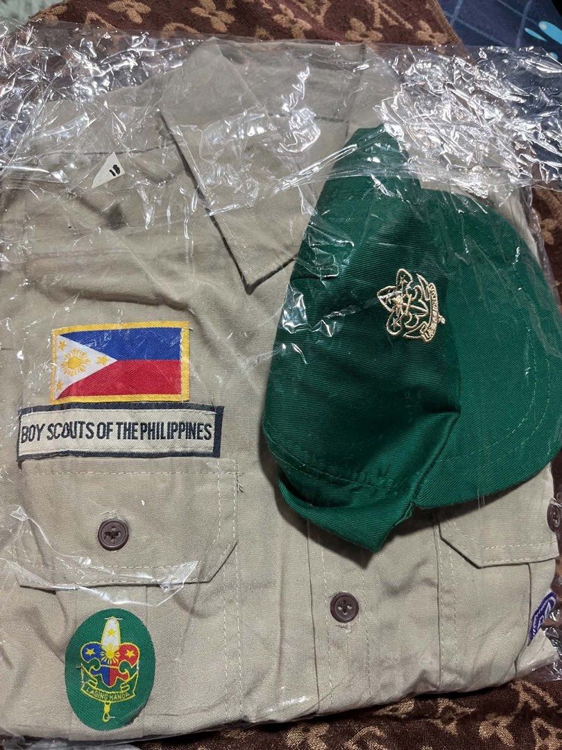 Boy scout set uniform (Category: Community) located in Caloocan City. Submitted by trebdy01 (Listing ID 1460734941, Image 2). Description: Once lng nagamit Size 18 Shirt width(17 to 18 inches/ height 23inches Short 24 inches waist Cap Scarf Once lng ginamit like new.