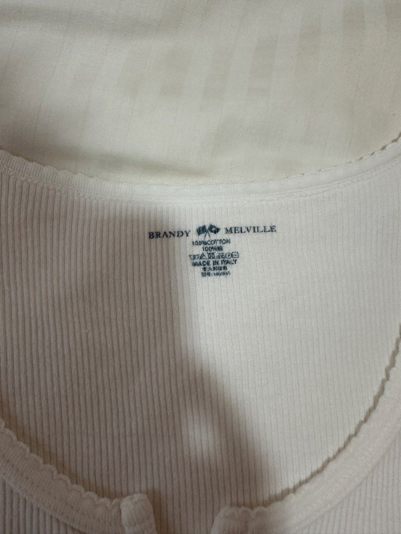Brandy Melville White Zelly top (Category: Shirts) located in Taguig. Submitted by aandco. (Listing ID 1460884427, Image 3). Description: - like new - Last price - near BGC - If you buy more than 1 I give discounts .