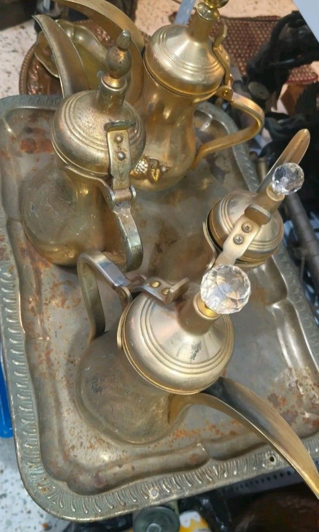 brass tea pot (Category: Coffee & Tea Tableware) located in Bacoor. Submitted by raf.vintage (Listing ID 1460780129, Image 1). Description: for sale 4 pcs tea pot take all for 1,200.