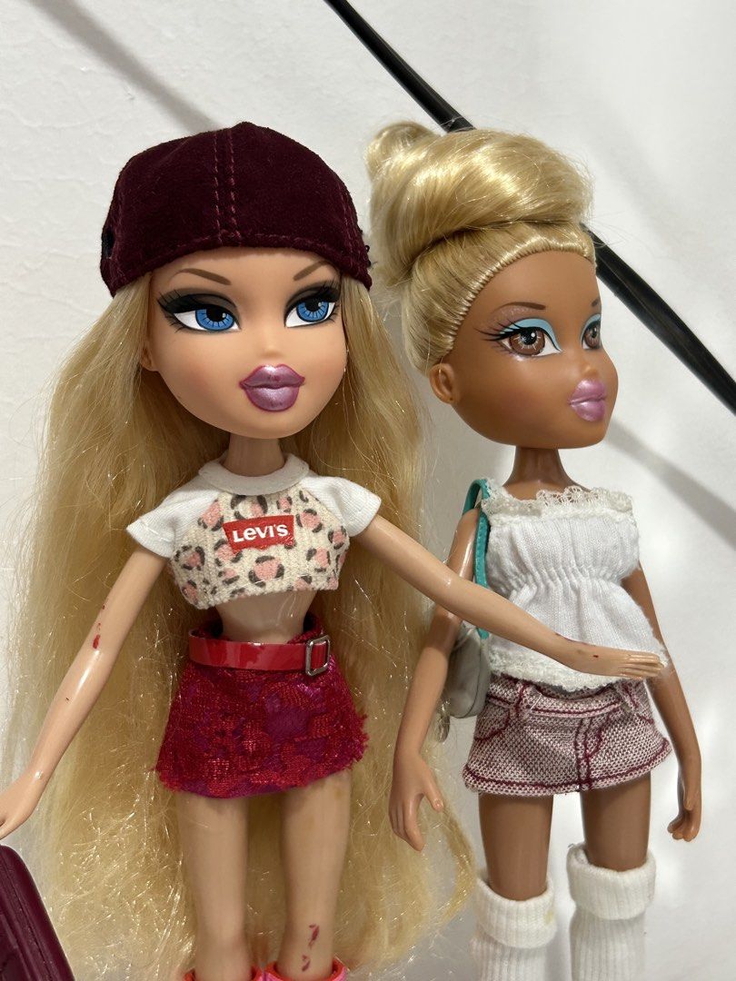 Bratz Designed by Chloe and Ice Championz Vinessa (Category: Kids Toys) located in Batangas. Submitted by nommi26 (Listing ID 1460720908, Image 2). Description: Chloe nude has some red stains w/c I think are still removable & lipchip , just needs hairspa ₱1450 Vinessa nude no issue, need a little hairspa ₱1250 take both ₱2500.