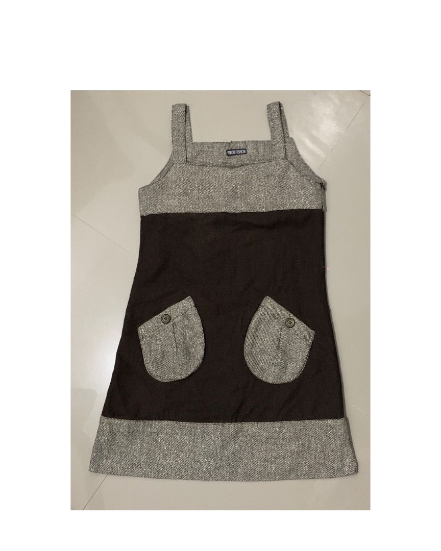 Brown & Tweed Pinafore Dress with Pockets (Category: Dresses) located in Caloocan City. Submitted by missymisskz (Listing ID 1460897364, Image 1). Description: - Adorable pinafore dress - Features a brown fabric bottom half - Tweed fabric on the top and hem - Two functional buttoned pockets on the front - Button details on the straps - Ideal for stylish layering.