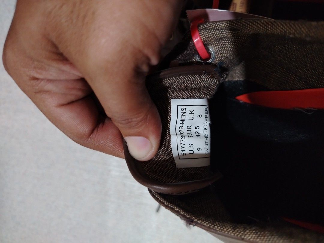 Brown Leather Lace-up Sneakers (Category: Casual Shoes) located in Manila. Submitted by choyxxvi (Listing ID 1460735736, Image 2). Description: Brown leather sneakers with white soles. Classic lace-up style. Red accent detail on the side. Comfortable for everyday wear. Great pair of casual shoes..