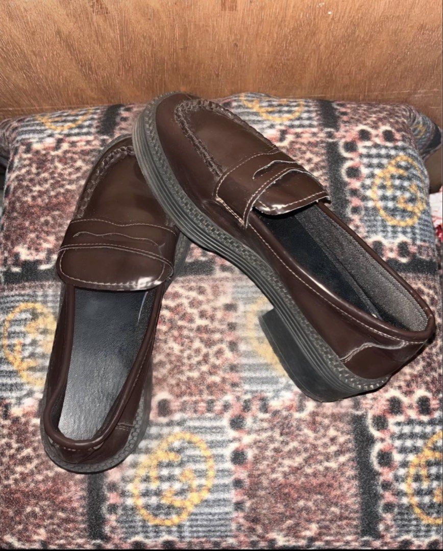 Brown Penny Loafers with Chunky Sole (Category: Loafers) located in Dagupan City. Submitted by shanadongsb (Listing ID 1460850476, Image 1). Description: - Classic brown penny loafers - Shiny finish - Sturdy, chunky sole - Detailed stitching - Easy slip-on style - Ideal for school or casual wear.