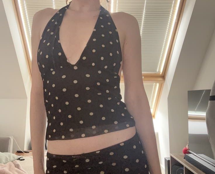 Brown Polka Dot Halter Top & Mini Skirt Set (Category: Sets or Coordinates) located in Manila. Submitted by iaious (Listing ID 1460743737, Image 1). Description: - Cute brown halter top with white polka dots - Matching mini skirt included - Both pieces are lightweight and flowy - Ideal for summer or a night out - Top features a deep V-neck and ties at the neck - Skirt has a ruffled hem - Versatile styling with sandals or heels.