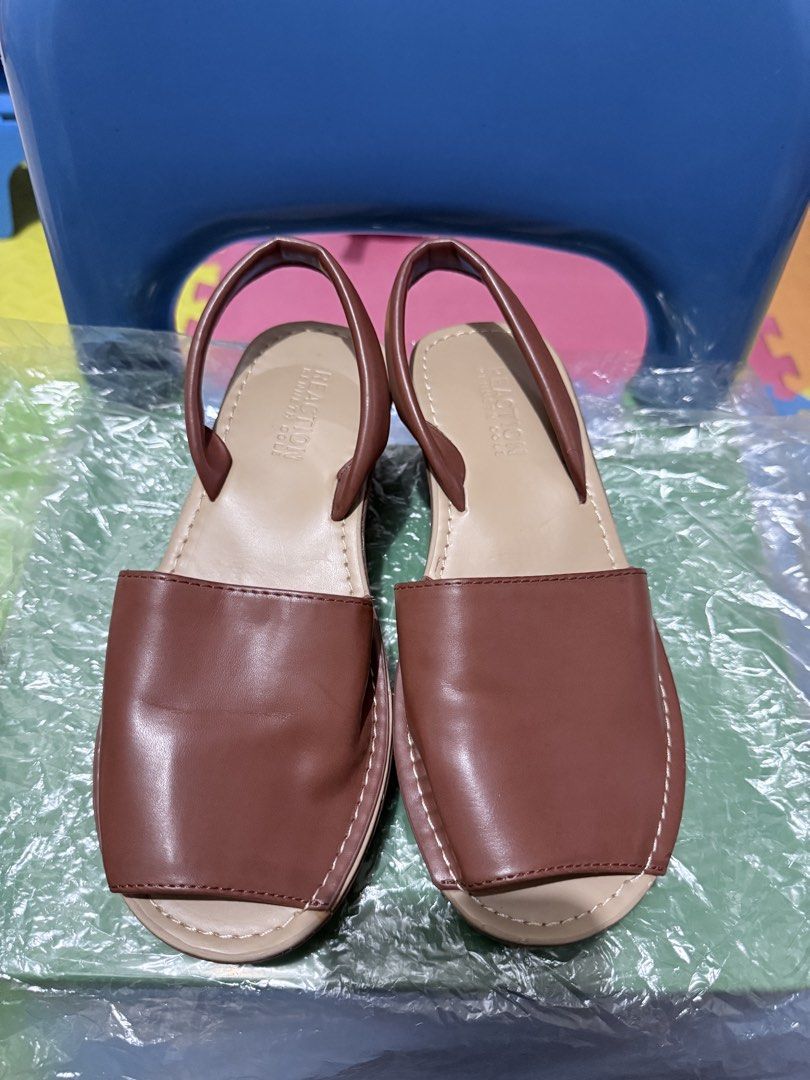 Brown Sandals Reaction by Kenneth Cole (Category: Flats & Sandals) located in Mandaluyong City. Submitted by sandarah (Listing ID 1460870050, Image 1). Description: -Brown wedge sandals -Sling back .