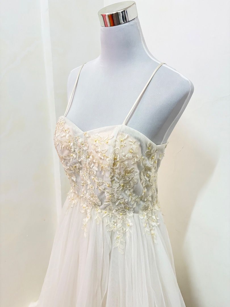 Budget-Friendly Pre-Loved Wedding Gown (Category: Evening dresses & gowns) located in Taguig. Submitted by simplyjar (Listing ID 1460912683, Image 3). Description: Pre-loved wedding gown.🌻 Bought this gown but ended up choosing a different gown because it’s smaller for me, so I never got to wear this on my wedding. It was already pre-loved when I bought it. Details: • Size: Medium •Bust - 32-36 •Waist - 24-30 • Hips - 36 • Height - 5’2 • Adjusta