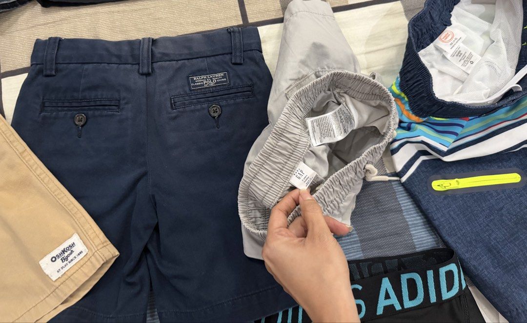 BUNDLE Kids Shorts CODE 11 (Category: Babies & Kids Fashion) located in Rizal. Submitted by caintarizal2024 (Listing ID 1460756425, Image 3). Description: BUNDLE 10 pcs shorts ALL OG 3 pcs Adidas small garterize 20 inches to 24 inches OSHKOSH 4T Gap 2 years RL 3/3T Wonder nation 4-5 Place 10 True Religion Mexico 8 Wrangler 10 Already packed na po siya and ready to ship. Hindi ko na rin po siya mapipicturan ulit kasi naka-pack na po. Thank you for