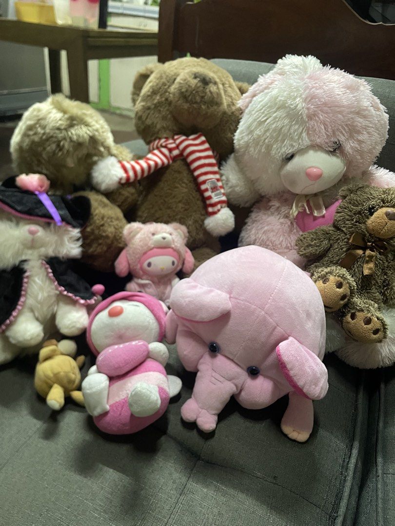 Bundle of Assorted Plush Toys - Bears, Elephant, Cat (Category: Plushies & Soft Toys) located in Caloocan City. Submitted by shirrbells (Listing ID 1460885560, Image 2). Description: - Adorable plush toy collection - Includes various teddy bears - Features a cute pink elephant - Comes with a cat wearing a witch hat - Other smaller character plushies included - Ideal for children or collectors - Many plushies have charming accessories like scarves