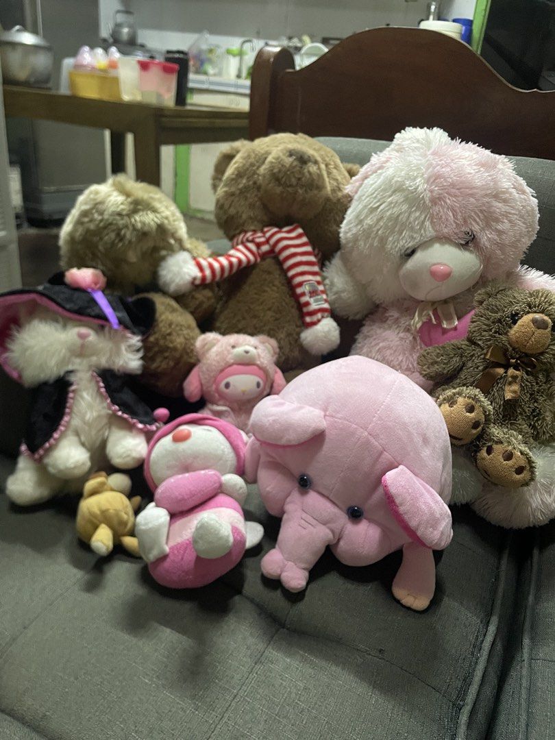 Bundle of Assorted Plush Toys - Bears, Elephant, Cat (Category: Plushies & Soft Toys) located in Caloocan City. Submitted by shirrbells (Listing ID 1460885560, Image 1). Description: - Adorable plush toy collection - Includes various teddy bears - Features a cute pink elephant - Comes with a cat wearing a witch hat - Other smaller character plushies included - Ideal for children or collectors - Many plushies have charming accessories like scarves