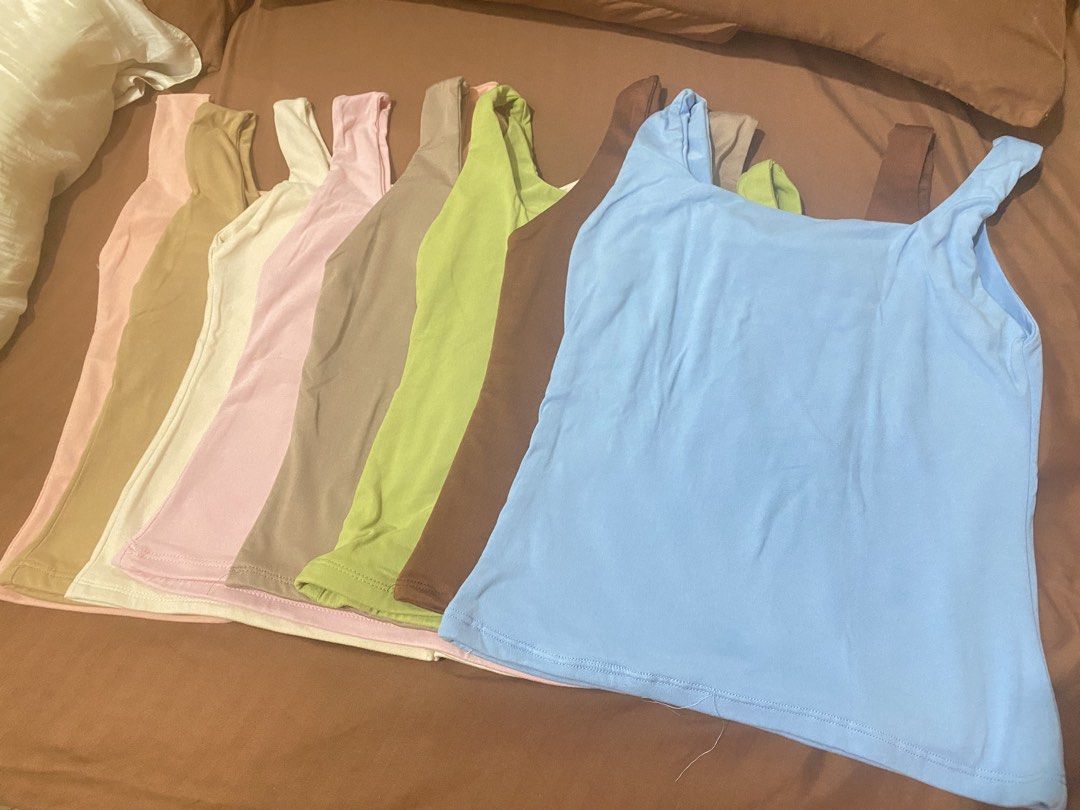Bundle of Basic Tank Tops - Various Colors (Category: Sleeveless) located in Pasig City. Submitted by sachiko_nakohara (Listing ID 1460844376, Image 2). Description: - RFS : Doesn’t fit me. Bought wrong size. - Estimated can fit S-M. - Non padded - Price still negotiable (pass to lowballers) - Bought from T-App and can’t find the seller anymore - Versatile for layering or standalone wear - Soft and semi stretchy material - Available in pastel and