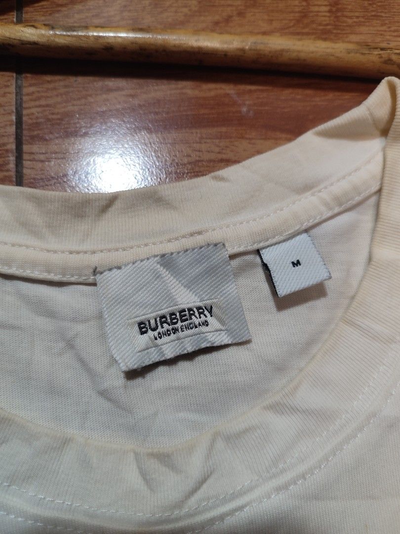 Burberry big logo (Category: Tshirts & Polo Shirts ) located in Bacoor. Submitted by theplugthrifted (Listing ID 1460737889, Image 3). Description: Burberry - size medium dimension 21.5x28.5 vgood condition needwash only since fresh from bale mine : 850+sf👌 cavite location unli vouch for safety - DM 📥.