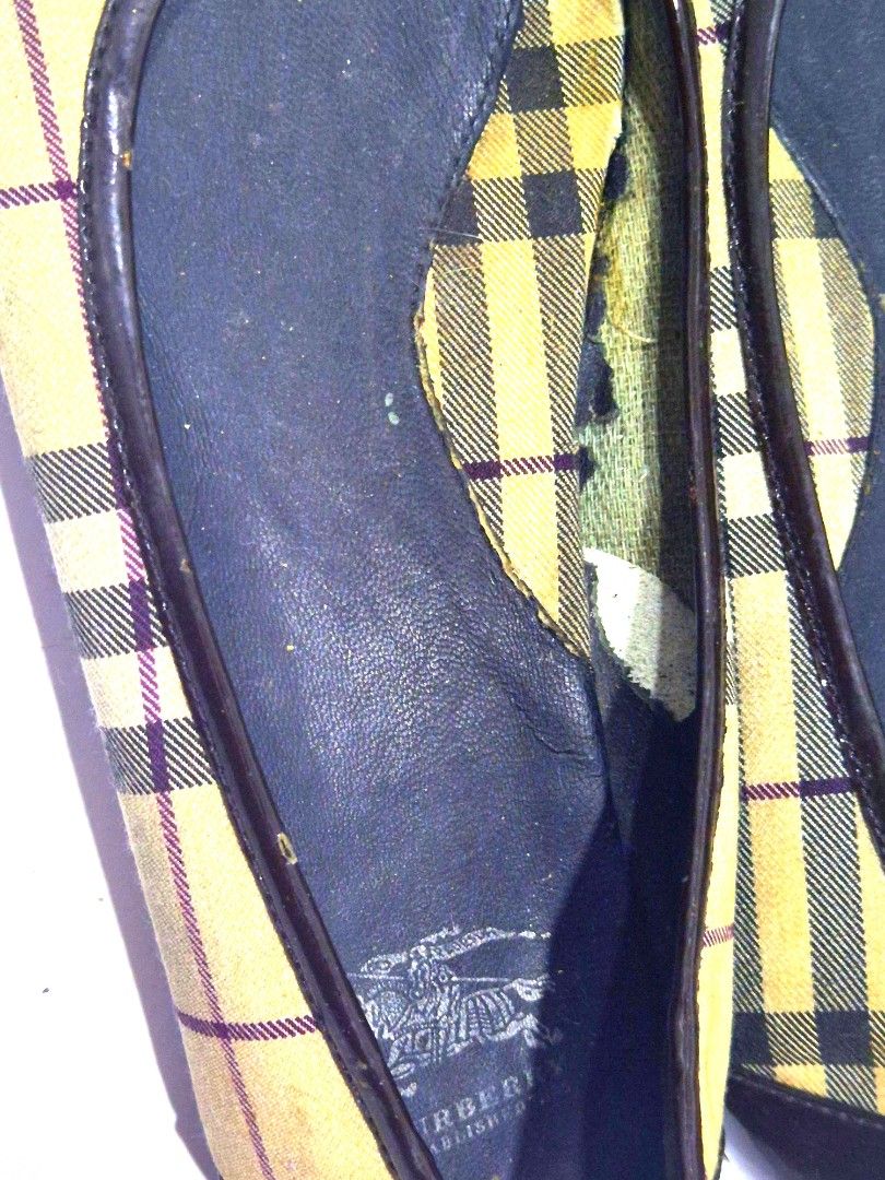 Burberry Nova Check Ballet Flats 7M (Category: Flats & Sandals) located in Antipolo. Submitted by saribymonica (Listing ID 1460899834, Image 2). Description: - Classic Burberry flats - Iconic nova check pattern - Patent toe cap with bow detail - Soles show some wear - Inner lining has some tearing - Great for everyday wear.