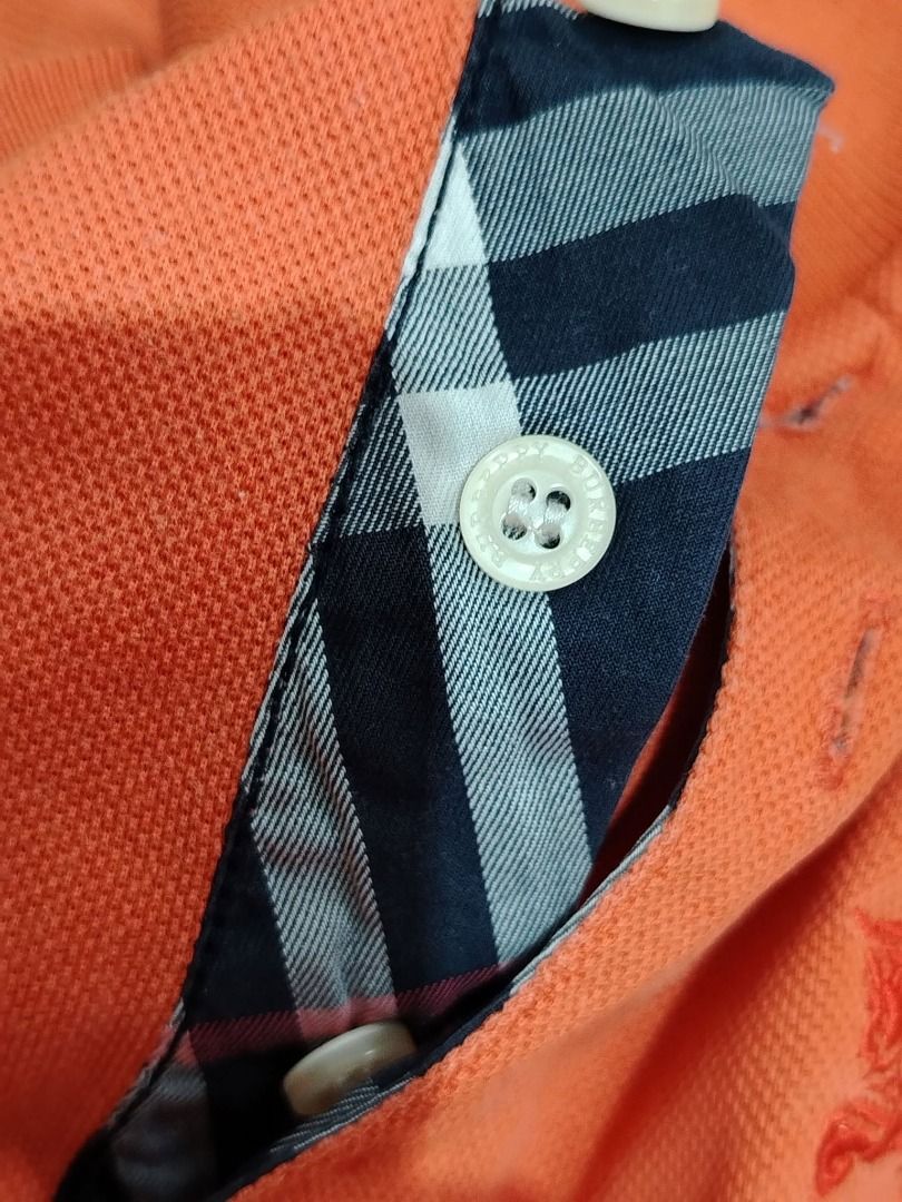 Burberry Polo Shirt (Category: Tshirts & Polo Shirts ) located in Dasmarinas. Submitted by amthriftmixph.2001 (Listing ID 1460730121, Image 3). Description: BRAND: Burberry SIZE: Medium - Large DIMES: 20.5" Width x 31.5" Length CONDITION: 9/10 COLOR RATE: 9/10 TAGS: With Brand Tags ISSUE: None.