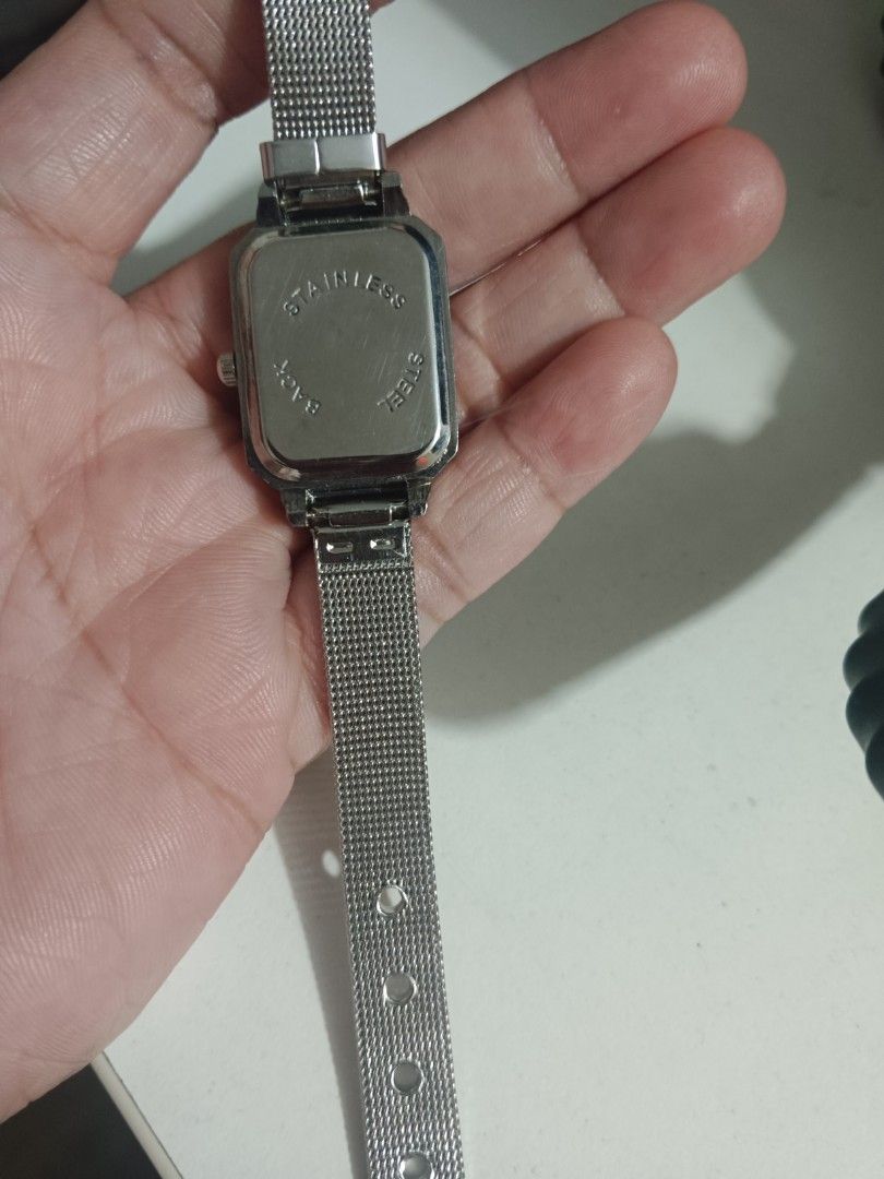 Calvin Klein Quartz Watch - Mint Green Face (Category: Women's Watches) located in Manila. Submitted by clover_co. (Listing ID 1460881486, Image 3). Description: - Elegant Calvin Klein watch - Beautiful mint green watch face - Sparkling stone hour markers - Stylish silver mesh strap - Durable stainless steel back - In excellent working condition .