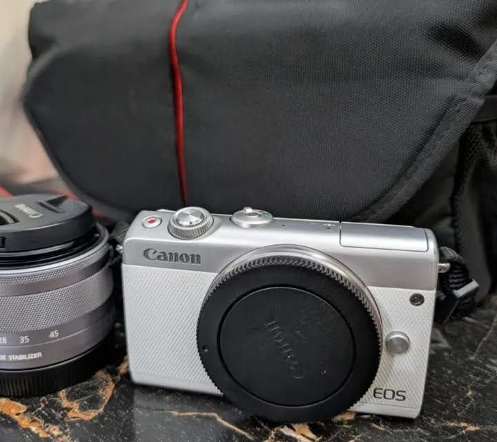 Canon Eos M100 (White) (Category: Cameras) located in Quezon City. Submitted by youngcat_4e2d03 (Listing ID 1460916854, Image 1). Description: FOR RUSH SELLING CANON EOS M100 (WHITE) Complete inclusions. Freebies: camera bag, SD card (64gb) NO issues. Price :19,000.