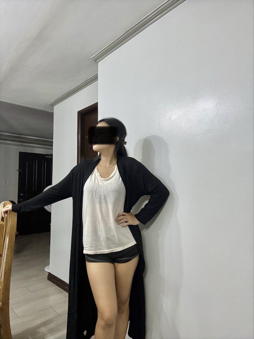 Cardigan dress (Category: Coats, Jackets and Outerwear) located in Quezon City. Submitted by soloqueenph (Listing ID 1460755493, Image 2). Description: Long black cardigan, perfect for layering. Soft, versatile, and easy to style. Can fit to medium-xxl .