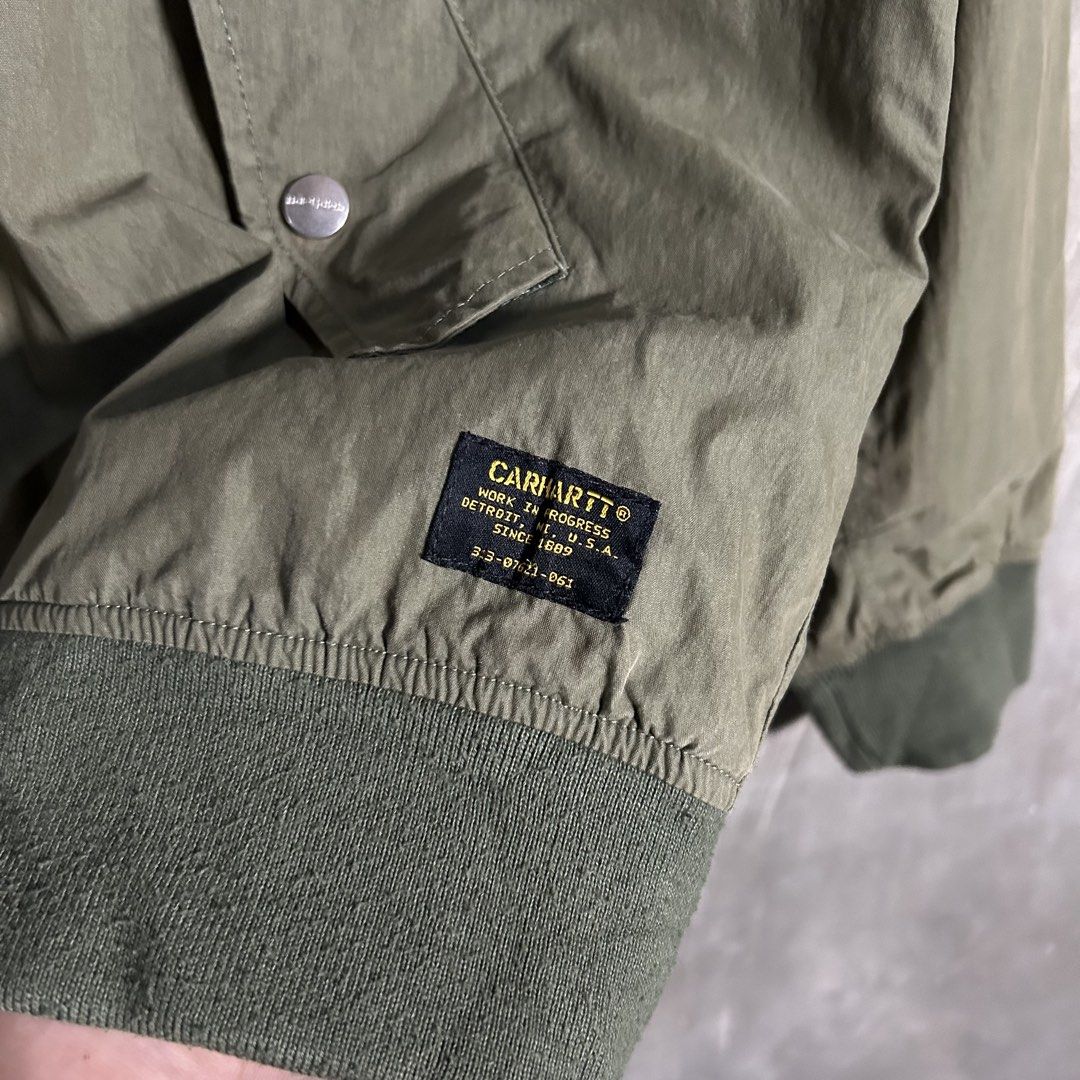 Carhartt - Nylon Bomber Jacket (Category: Coats, Jackets and Outerwear) located in Tayabas. Submitted by streetdepartment (Listing ID 1460904917, Image 2). Description: Carhartt - Nylon Bomber Jacket Measurements (inches): Width: 22.5” Length: 25.5” Tagged as Medium Good condition Flaw/s: fadings on upper part .