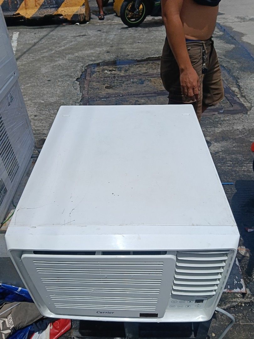 Carrier Window Type Aircon (Category: Air Conditioning and Heating) located in Manila. Submitted by jamaya09 (Listing ID 1460717844, Image 2). Description: - Carrier Window Type Air Conditioner - White Casing - Effective Room Cooling - Controls: Fan, Mode, Timer, Swing - Digital Display for Temperature - Unit is Clean and Ready for Installation.