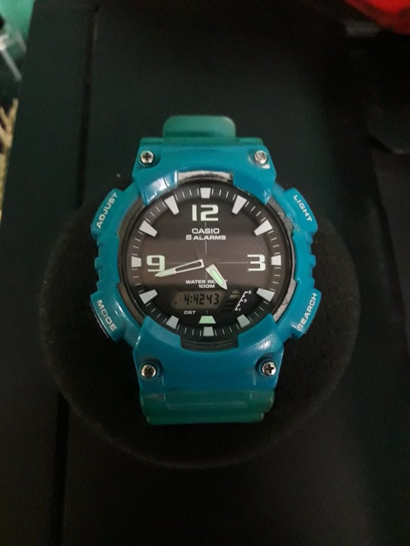 Casio G-Shock Analog-Digital Watch Teal (Category: Men's Watches) located in Paranaque City. Submitted by omaraguirre (Listing ID 1460763158, Image 1). Description: - Teal Casio G-Shock watch - Dual analog and digital displays - Water resistant up to 100 meters - Easy-to-use buttons: Light, Adjust, Mode, Search - Adjustable band for a comfortable fit - Ideal for everyday wear and sports activities.