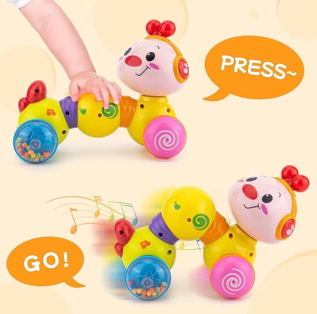 Caterpillar Musical Crawl Toy (Category: Infant Playtime) located in Makati City. Submitted by travelfinds34611 (Listing ID 1460835805, Image 2). Description: Caterpillar Musical Crawl Toy - Fun musical caterpillar toy for babies - Press down, let go & it rolls along the floor - Great for encouraging crawling - Minor scuffs from normal play GOOD CONDITION. MINOR SCUFF MARK ON FACE (BARELY NOTICEABLE) & ON BACK (SEE PHOTOS 9 & 10).