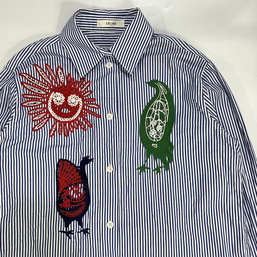 CELINE - PHOEBE PHILO STRIPED SHIRT (Category: Shirts) located in Bacolod City. Submitted by the.finest (Listing ID 1460903331, Image 2). Description: Celine- Phoebe Philo Striped Button up Shirt - Crochet and Embroidered details Tag Size: Missing Width: 21.5 Length: 27 Condition: 9/10 2,500+shipping fee.