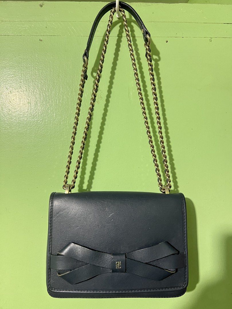 CH Carolina Herrera Bow Flap Bag (Category: Luxury Bags & Wallets) located in Bulacan. Submitted by thriftstationplus (Listing ID 1460815296, Image 1). Description: Carolina Herrera Bag Thrifted Manage your expectations… Selling As Is… Still Presentable… No Return No Refund… Overall condition of Bag is 7/10 Hardware is 6/10 Leather is 7/10 Suede inside 6.5/10 Sturdy and a bit structured… .