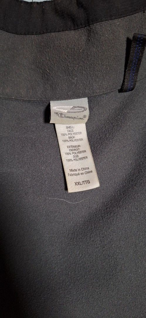 Champion Black Full Zip Jacket XXL/TTG (Category: Coats, Jackets and Outerwear) located in Manila. Submitted by ags028705 (Listing ID 1460916276, Image 2). Description: - Black Champion jacket - Full zip closure - Zippered chest pocket - Two side pockets - Lined interior for warmth - Size XXL/TTG - Made in China.
