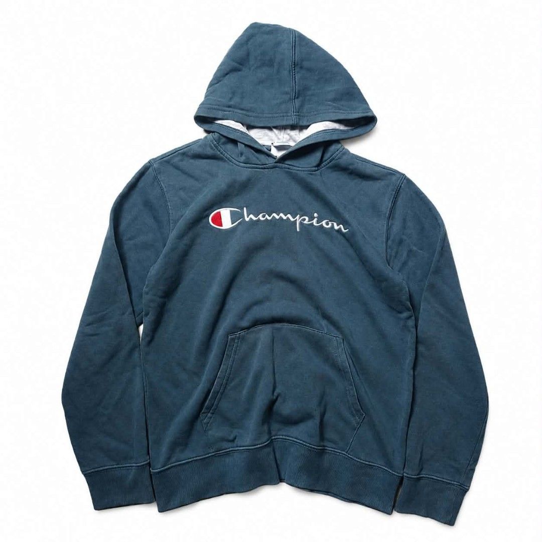 Champion Hoodie Blue (Category: Hoodies) located in Manila. Submitted by chieezz (Listing ID 1460860241, Image 1). Description: - Classic Champion hoodie in a faded blue color. - Features the iconic embroidered Champion logo on the chest. - Includes a convenient front pouch pocket. - Adjustable drawstring hood for a personalized fit. - Ideal for comfortable and stylish casual wear..