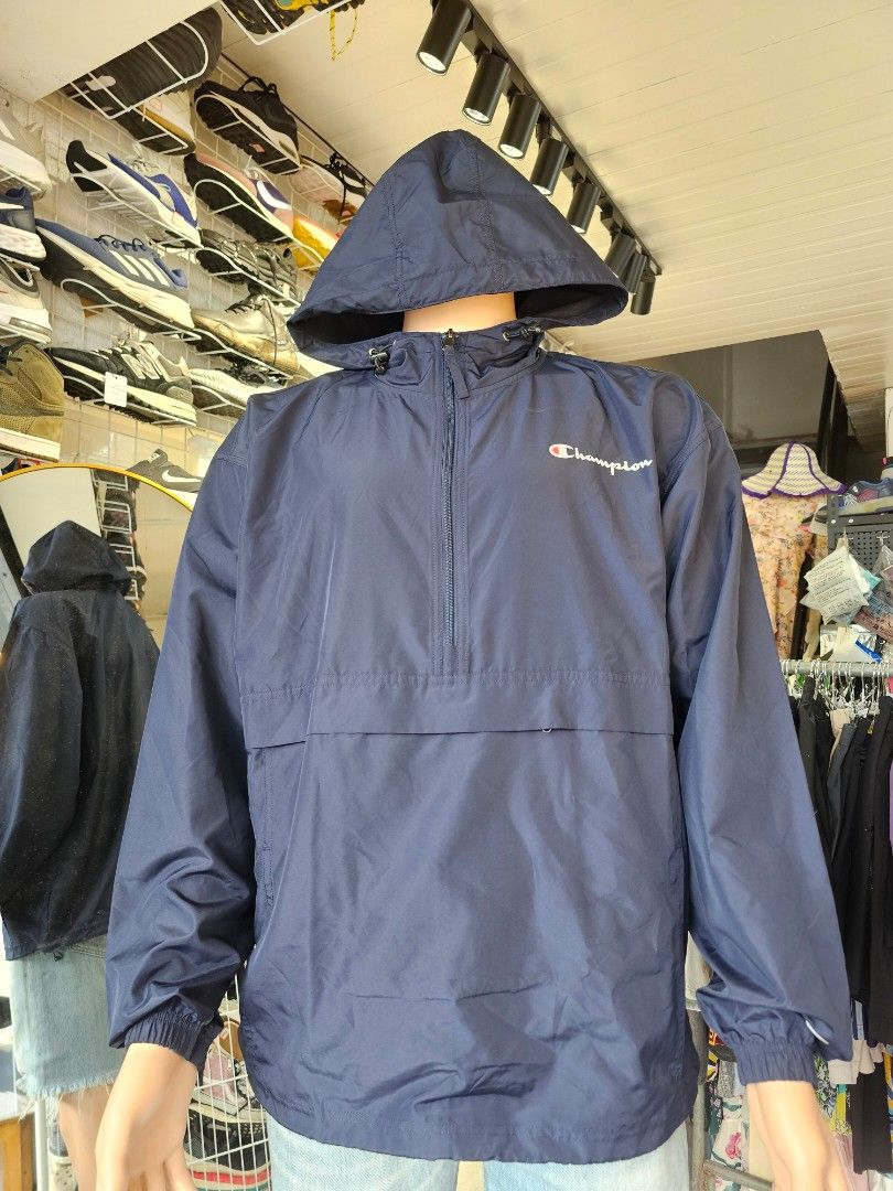 Champion Men's Stadium Packable Anorak Jacket (Category: Coats, Jackets and Outerwear) located in Baguio. Submitted by kayeonlineshop (Listing ID 1460740455, Image 2). Description: -Champion Packable Windbreaker in navy blue -Weather Resistance: Cut from a lightweight, wind-resistant, and water-resistant micro-poplin fabric layer designed to protect against light rain and sudden wind gusts -measurements included in the photos.