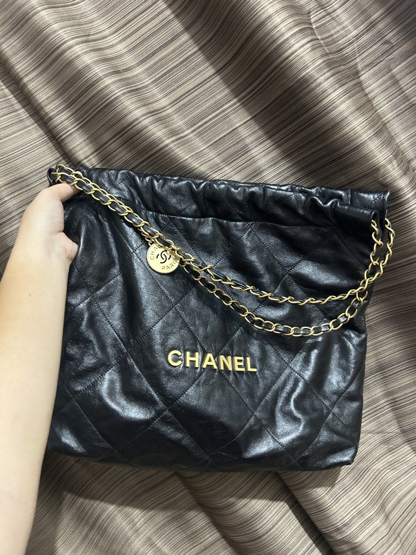 Chanel Black Leather Quilted Chain Shoulder Bag (Category: Luxury Bags & Wallets) located in Tacloban City. Submitted by houseofluxury.co (Listing ID 1460715016, Image 2). Description: - Authentic Black Leather Chanel Shoulder Bag - Elegant Quilted Stitching - Classic Gold Hardware - Secure Magnetic Snap Closure - Spacious Main Compartment - Interior Zippered Pocket for Essentials - Stylish Gold Chain Strap with Leather Accents - Adorable Chanel 