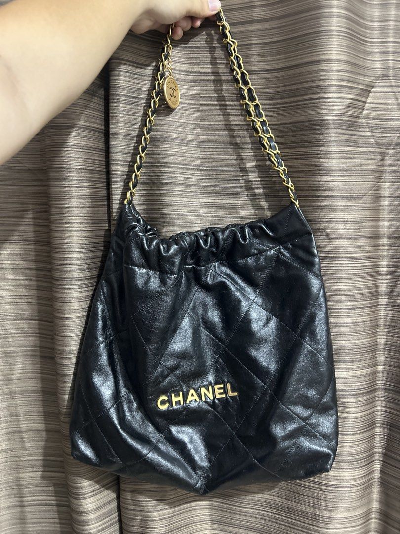 Chanel Black Leather Quilted Chain Shoulder Bag (Category: Luxury Bags & Wallets) located in Tacloban City. Submitted by houseofluxury.co (Listing ID 1460715016, Image 1). Description: - Authentic Black Leather Chanel Shoulder Bag - Elegant Quilted Stitching - Classic Gold Hardware - Secure Magnetic Snap Closure - Spacious Main Compartment - Interior Zippered Pocket for Essentials - Stylish Gold Chain Strap with Leather Accents - Adorable Chanel 
