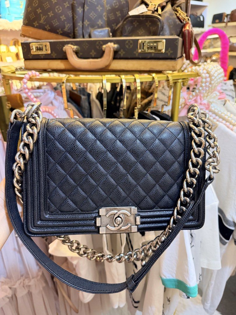 Chanel Black Quilted Leather Boy Bag (Category: Luxury Bags & Wallets) located in Dumaguete. Submitted by lovebags.ph (Listing ID 1460886078, Image 2). Description: - Classic Chanel Boy bag - Black caviar leather - Iconic diamond quilting - Chunky silver chain - Signature CC turn-lock closure - Timeless and versatile for day or night - Spacious interior for essentials Preloved from 🇰🇷.