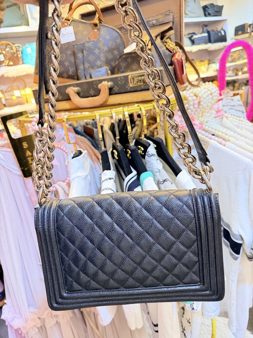 Chanel Black Quilted Leather Boy Bag (Category: Luxury Bags & Wallets) located in Dumaguete. Submitted by lovebags.ph (Listing ID 1460886078, Image 3). Description: - Classic Chanel Boy bag - Black caviar leather - Iconic diamond quilting - Chunky silver chain - Signature CC turn-lock closure - Timeless and versatile for day or night - Spacious interior for essentials Preloved from 🇰🇷.
