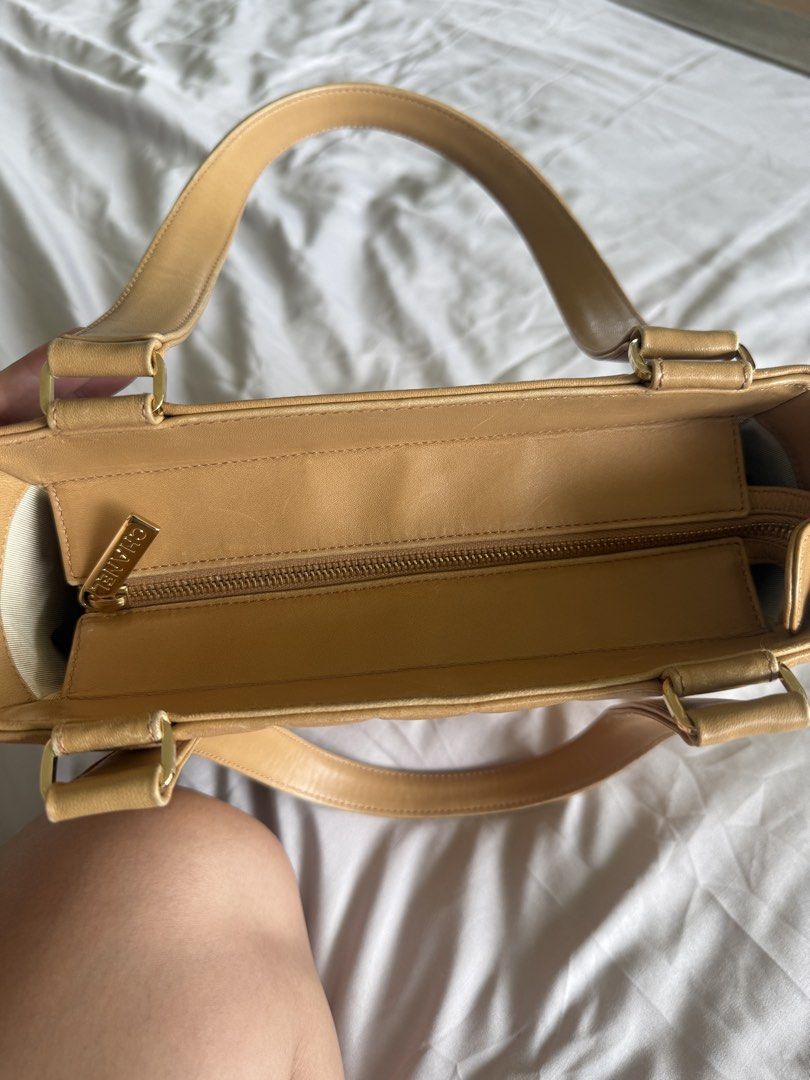 Chanel Chocobar Cream Tote (Category: Luxury Bags & Wallets) located in Calamba. Submitted by mom2girls (Listing ID 1460758797, Image 3). Description: Bag only. No inclusions. Kept in very good condition. The back part of the zipper end needs stitching. Otherwise, not an issue since you place that part inside the bag. See last 2 photos. Shipping via LBC only. SF c/o Buyer.