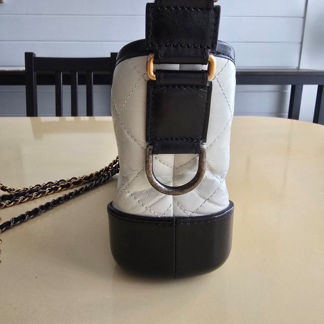 Chanel Gabrielle Small White/ Black (Category: Luxury Bags & Wallets) located in Paranaque City. Submitted by portodimoda (Listing ID 1460782144, Image 2). Description: AUTHENTIC AND AVAILABLE!!! Series 26... hologram intact. In excellent condition with normal signs of usage NO INCLUSIONS.