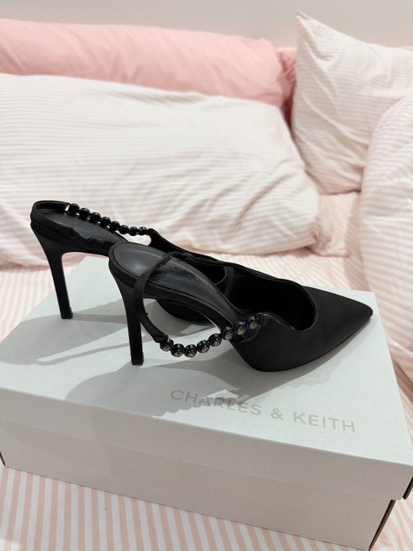 Charles & Keith Black Slingback Heels with Beaded Strap (SIZE 34) (Category: Heels) located in Imus. Submitted by allysadiana (Listing ID 1460724596, Image 2). Description: - Brand: Charles & Keith - Style: Slingback heels - Color: Black - Toe: Pointed - Features: Beaded embellishment on ankle strap - Includes: Original box - Occasion: Dress up any outfit.