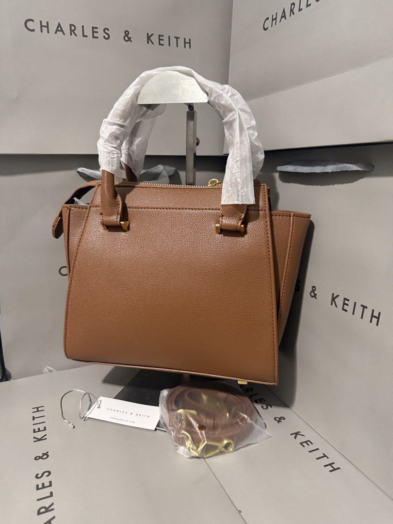 Charles&keith structured trapeze bag (Category: Cross-body Bags) located in Cavite. Submitted by miksycrls (Listing ID 1460629316, Image 3). Description: 📌REMINDER PLS READ BELOW ⬇️ ✨INCLUSION✨ 🔗TAG&DUSTBAG,CNKPLASTIC 🔗WHAT YOU SEE IS WHAT YOU GET 🔗manage your expectations items are MPO | Mall Pull Out 📩 TO ORDER / ASK DETAILS: Send me a private message! +60paperbag 💸:GCASHH/GOTYMEE 📍:IMUSCAVITE 🚚:SCO|SPX EXPRESS SF ONLY📦 OTHER COURIER:�